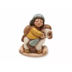 Bimbo su cavallo a dondolo - Thun