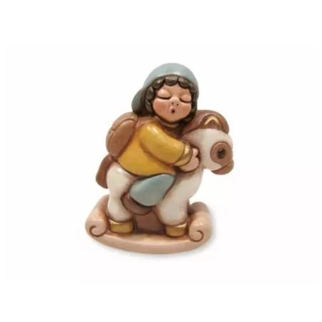 Bimbo su cavallo a dondolo - Thun