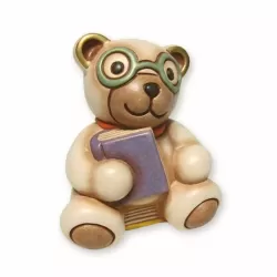 Teddy con occhiali seduto su libri - Thun