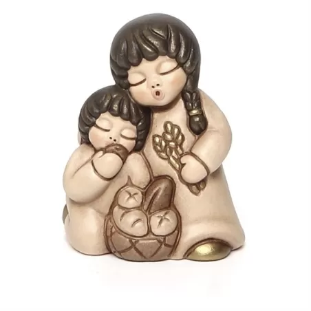 Coppia di bimbi che mangiano pane presepe classico, champagne - Thun