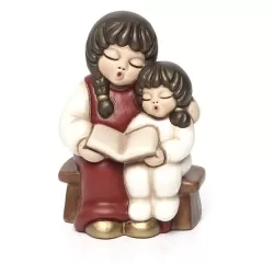 Coppia di bimbi che leggono presepe giubileo, rosso - Thun