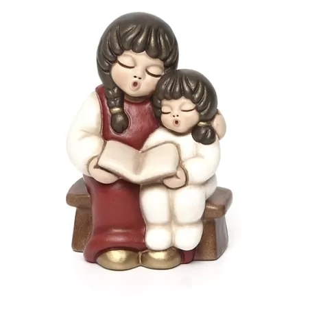 Coppia di bimbi che leggono presepe giubileo, rosso - Thun